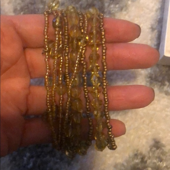 Nine orange and tan beaded bracelets - Picture 2 of 3